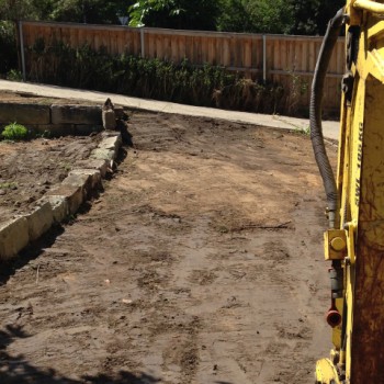 Front yard levelled and garden wall added