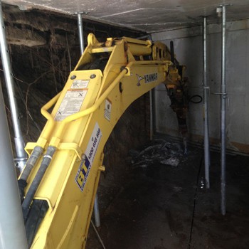 Rock hammering under house